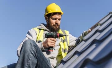 man working roof front view