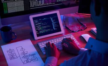 professional programmer working late dark office