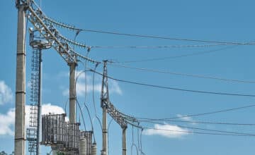 high voltage electrical transformers electricity distribution power plant high voltage power lines life power supply close up