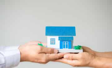 real estate broker agent presenting consult customer decision making sign insurance form agreement