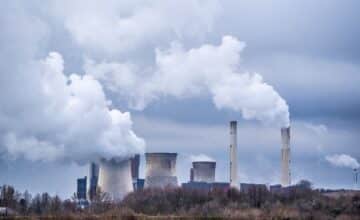 wide angle shot white smoke coming out nuclear plants