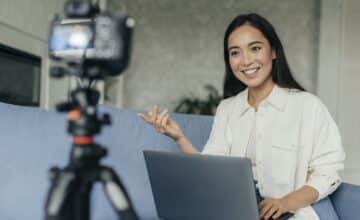 smiley woman doing vlog
